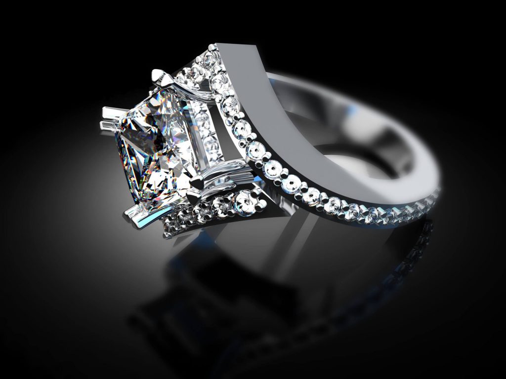 diamond engagement ring on black background