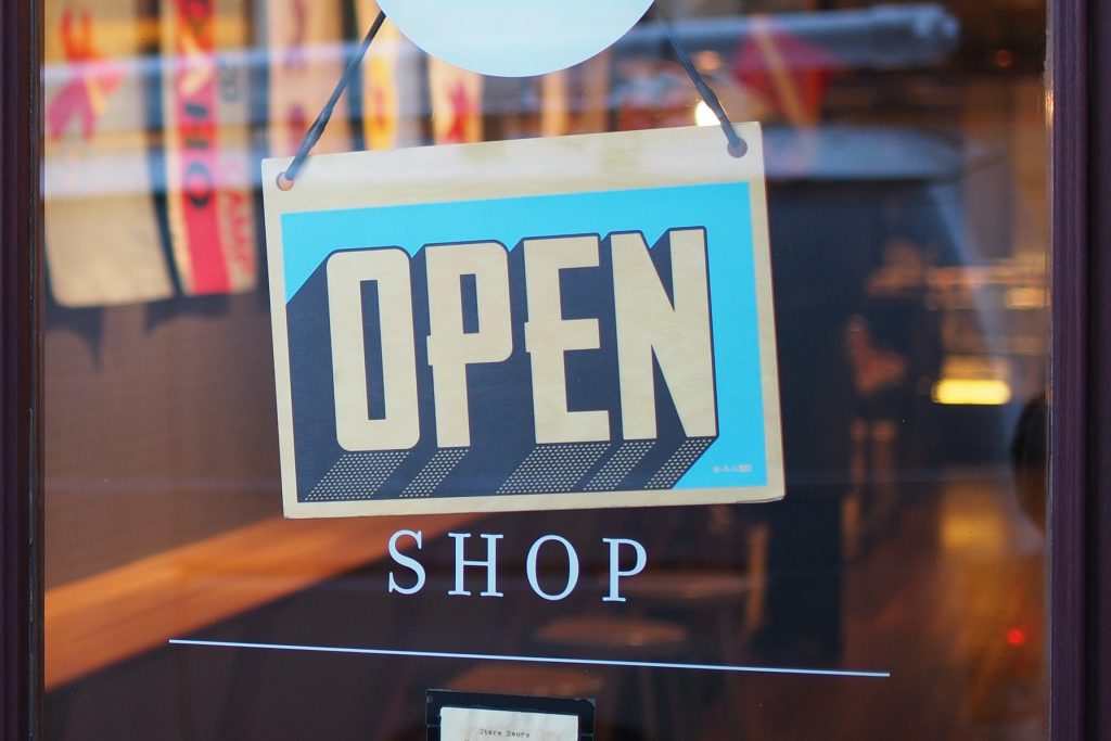 open sign on glass door