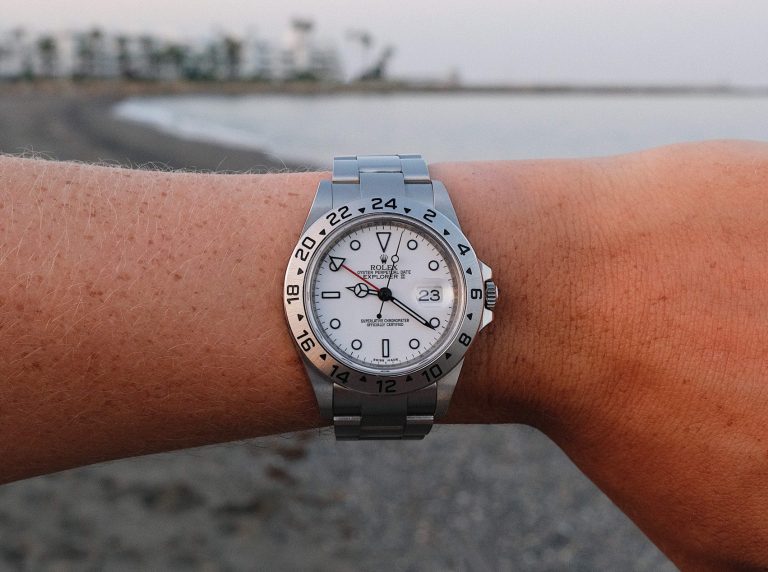 Rolex Watch On Mans Wrist At The Beach
